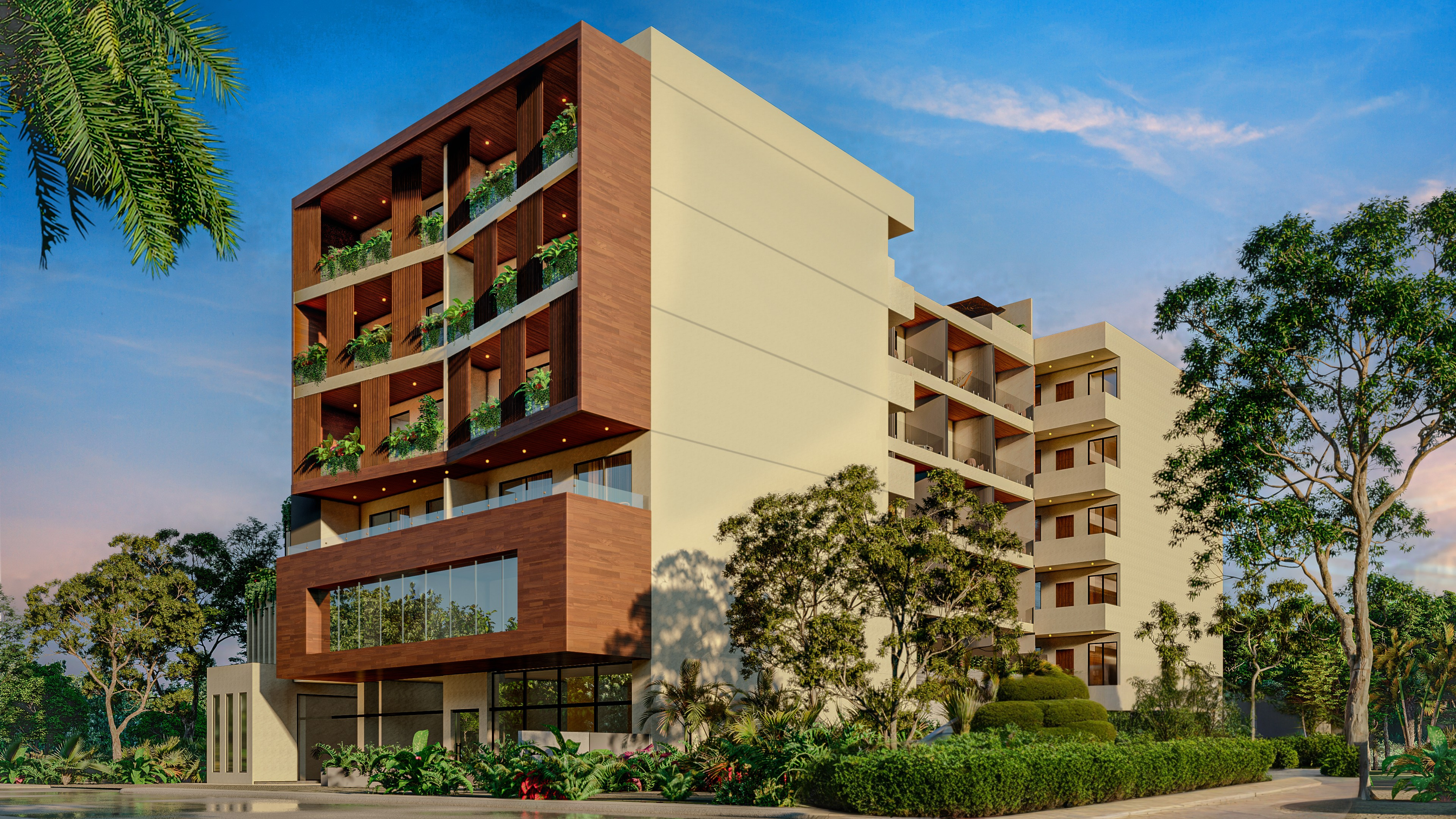 Central Condo Living — fachada al atardecer, Puerto Morelos